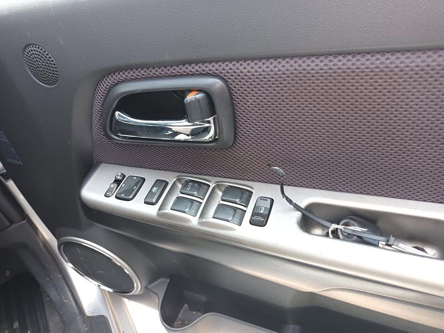 A Close Up of a Car Door With a Handle and Buttons — South West 4WD Wreckers In Harristown, QLD