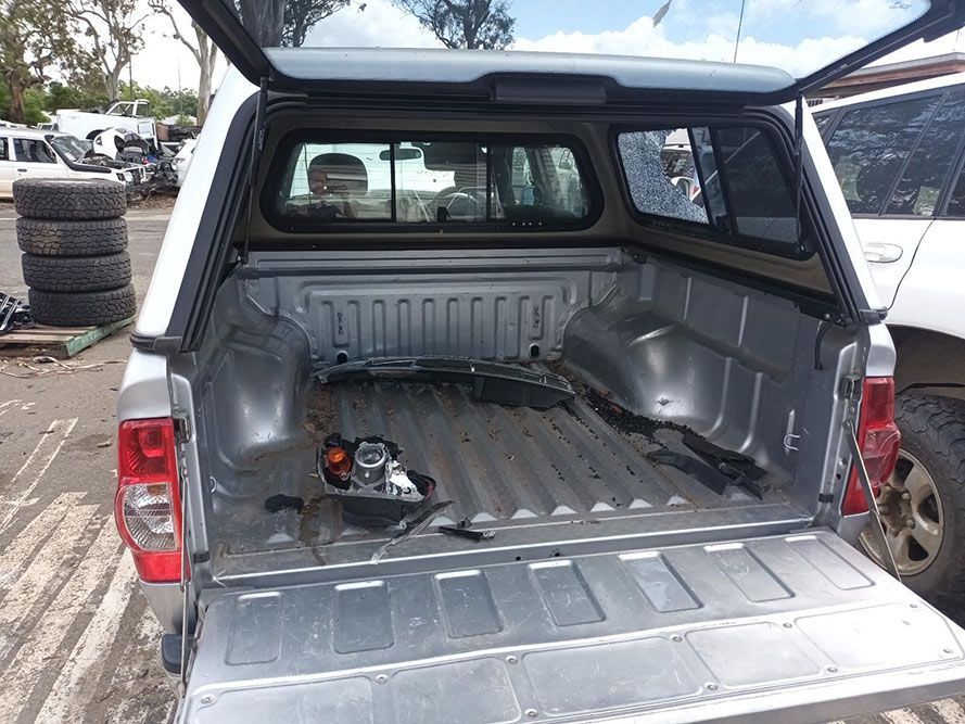 The Back of a Truck With the Bed Open and a Canopy — South West 4WD Wreckers In Harristown, QLD