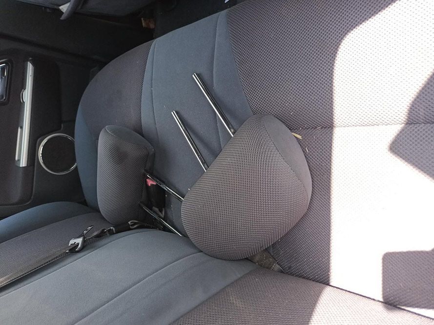 The Back Seat of a Car With a Broken Headrest — South West 4WD Wreckers In Harristown, QLD