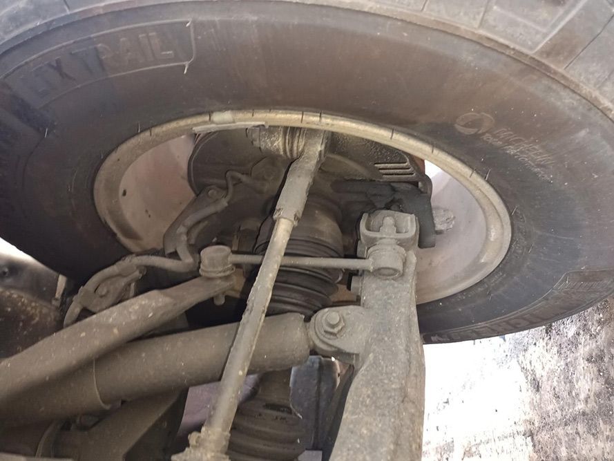 A Close Up of the Underside of a Tire on a Car — South West 4WD Wreckers In Harristown, QLD