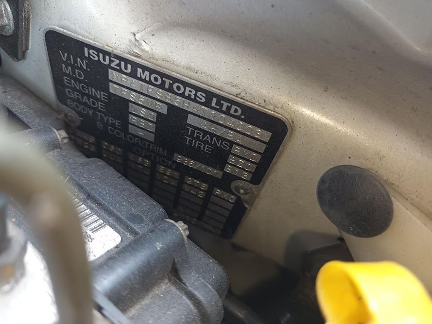 A Close Up of a License Plate on the Side of a Car — South West 4WD Wreckers In Harristown, QLD