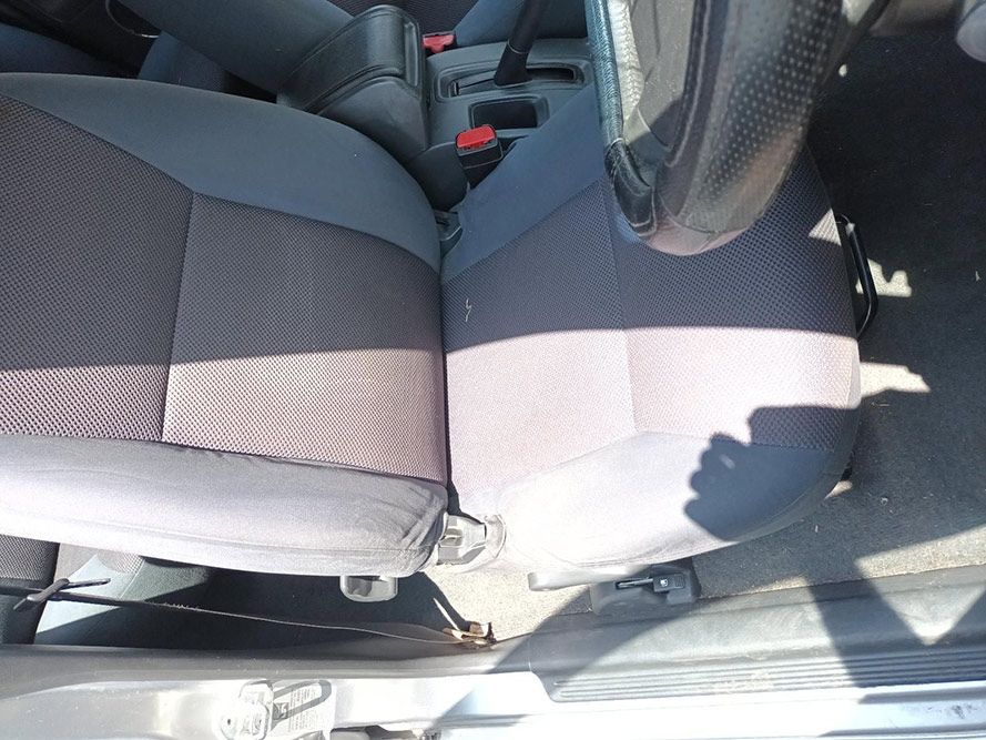 The Shadow of a Person is Cast on the Seat of a Car — South West 4WD Wreckers In Harristown, QLD