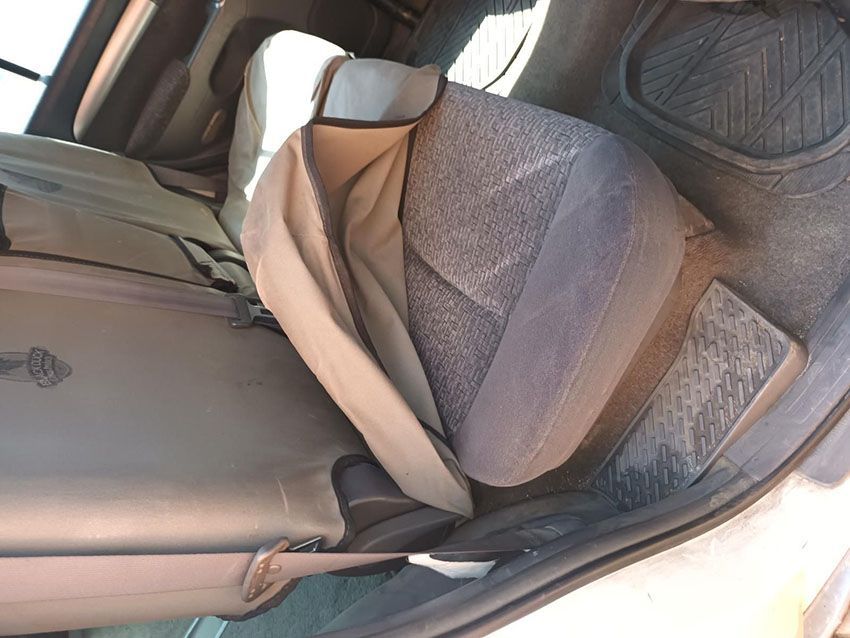 The Back Seat of a Car With a Seat Cover on It — South West 4WD Wreckers In Brisbane, QLD