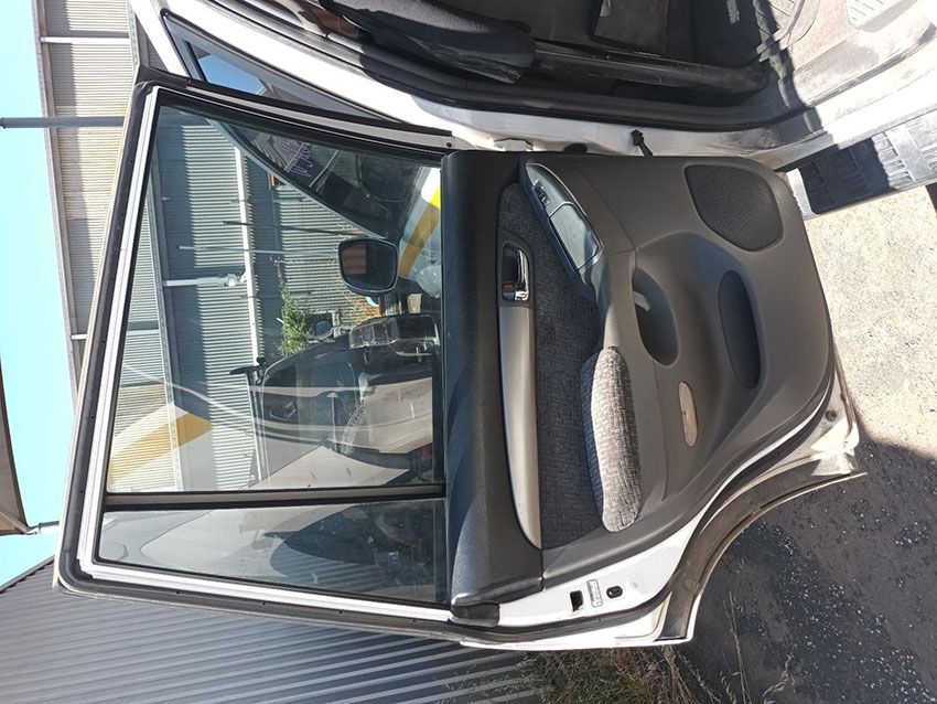 The Back Door of a Car With the Door Open — South West 4WD Wreckers In Brisbane, QLD