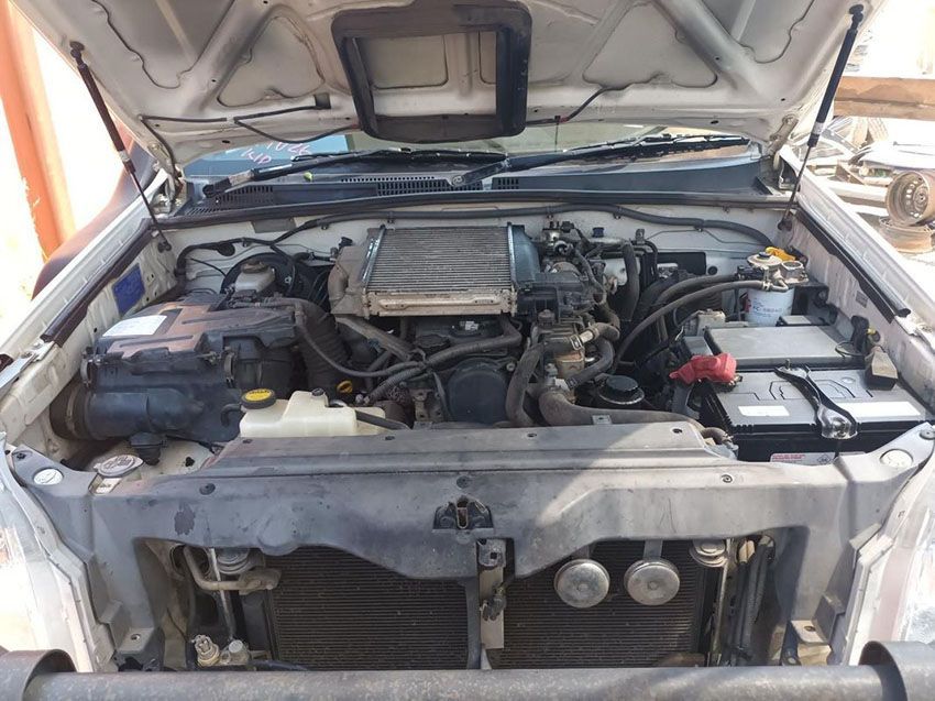 The Engine of a Car is Shown With the Hood Open — South West 4WD Wreckers In Brisbane, QLD