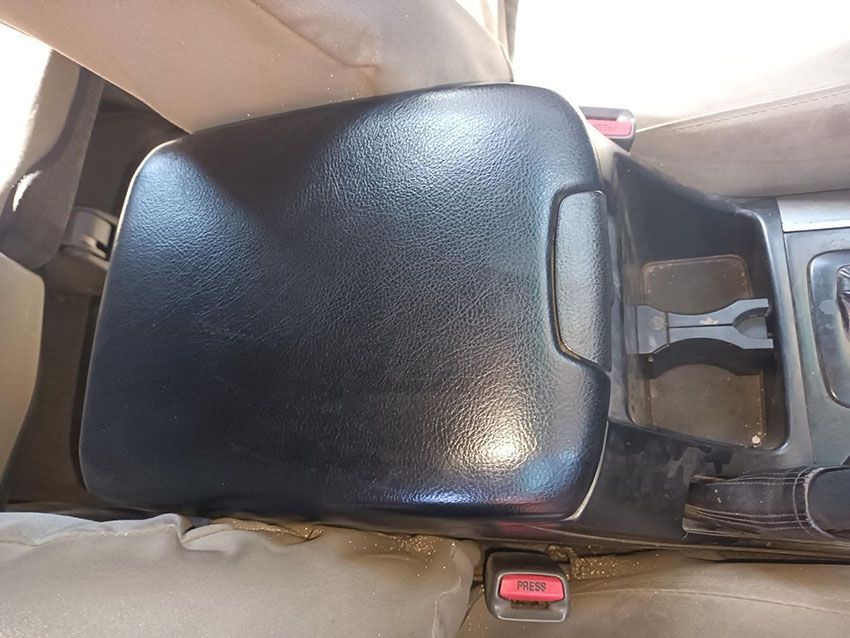A Black Center Console in a Car With a Red Button on It — South West 4WD Wreckers In Brisbane, QLD