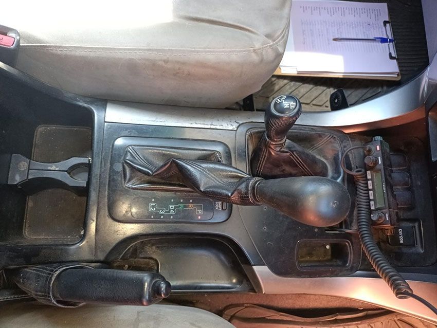 The Inside of a Car With a Phone and a Clipboard on the Floor — South West 4WD Wreckers In Brisbane, QLD