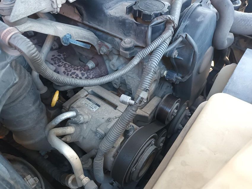 A Close Up of a Car Engine With a Hose Coming Out of It — South West 4WD Wreckers In Brisbane, QLD