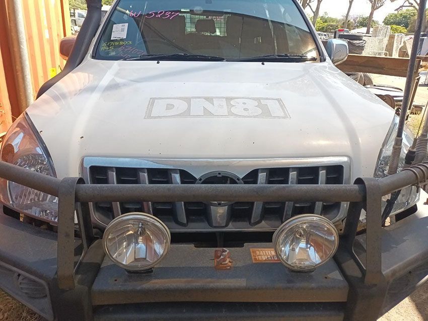 A White Truck With the Word Dn81 on the Hood — South West 4WD Wreckers In Brisbane, QLD