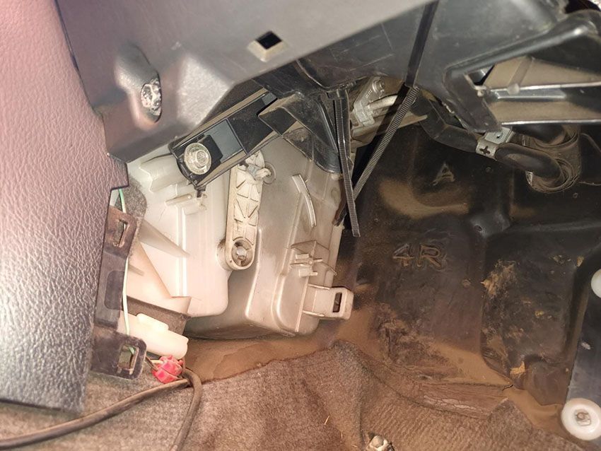 A Close Up of a Car Dashboard With a Dirty Floor — South West 4WD Wreckers In Brisbane, QLD