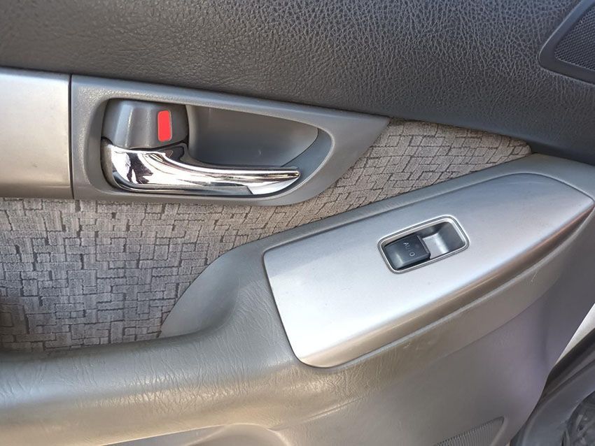 A Close Up of a Car Door With a Handle and a Window Switch — South West 4WD Wreckers In Brisbane, QLD