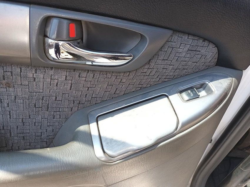 A Close Up of a Car Door Handle With a Red Button — South West 4WD Wreckers In Brisbane, QLD