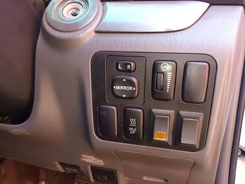 A Close Up of a Car Dashboard With Buttons and a Mirror — South West 4WD Wreckers In Brisbane, QLD