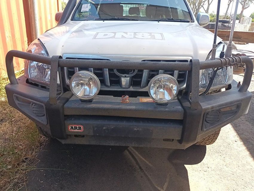 A White Truck With the Word Dnbt on the Hood — South West 4WD Wreckers In Brisbane, QLD