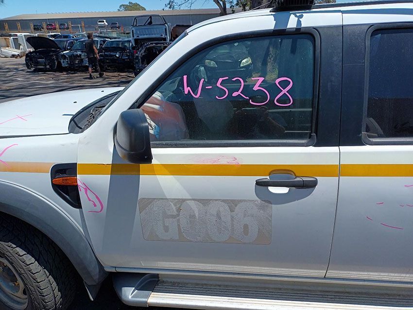 A White Truck With the Number W-5238 on the Door — South West 4WD Wreckers In Brisbane, QLD