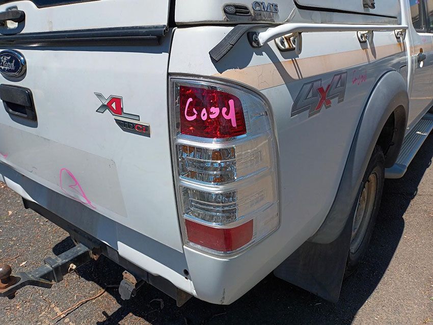 The Back of a White Truck With the Word Good Written on the Tail Light — South West 4WD Wreckers In Brisbane, QLD