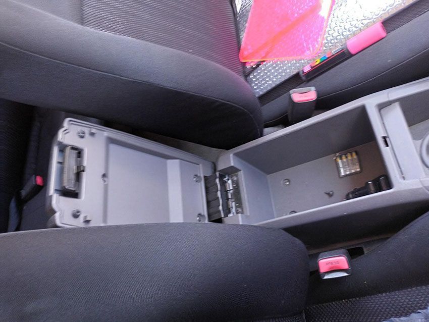 A Car Console With a Pink Item in It — South West 4WD Wreckers In Brisbane, QLD