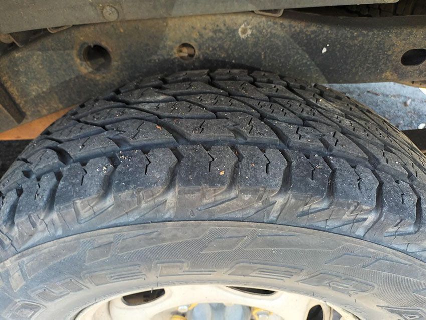 A Close Up of a Tire on a Car With a White Rim — South West 4WD Wreckers In Brisbane, QLD