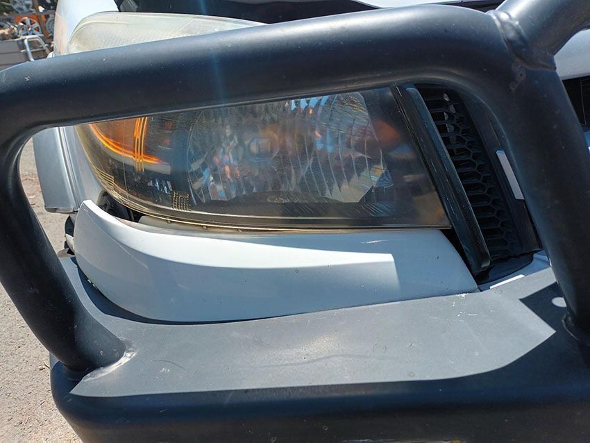 A Close Up of a Car 's Headlight With a Bumper — South West 4WD Wreckers In Brisbane, QLD