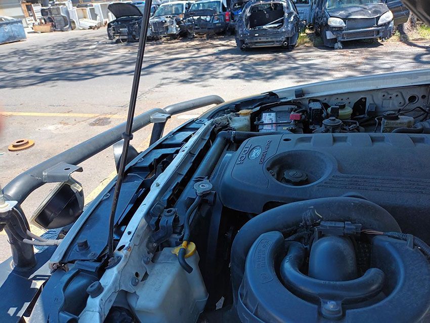 The Hood of a Car is Open and the Engine is Visible — South West 4WD Wreckers In Brisbane, QLD