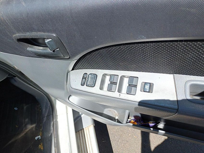 A Close Up of a Car Door With a Button That Says 60 on It — South West 4WD Wreckers In Brisbane, QLD