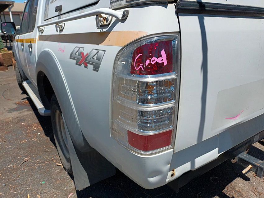 A White Truck With the Word Good Written on the Tail Light — South West 4WD Wreckers In Brisbane, QLD