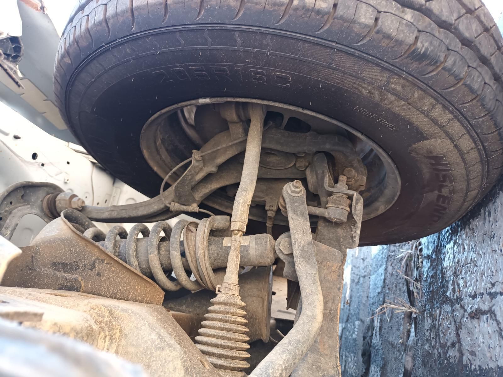 A Close Up of a Tire on a Car's Suspension System — South West 4WD Wreckers In Brisbane, QLD