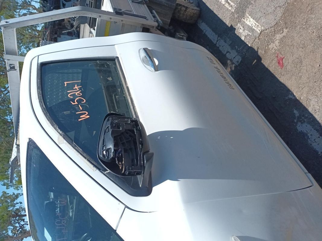 A White Truck is Parked on the Side of the Road — South West 4WD Wreckers In Brisbane, QLD