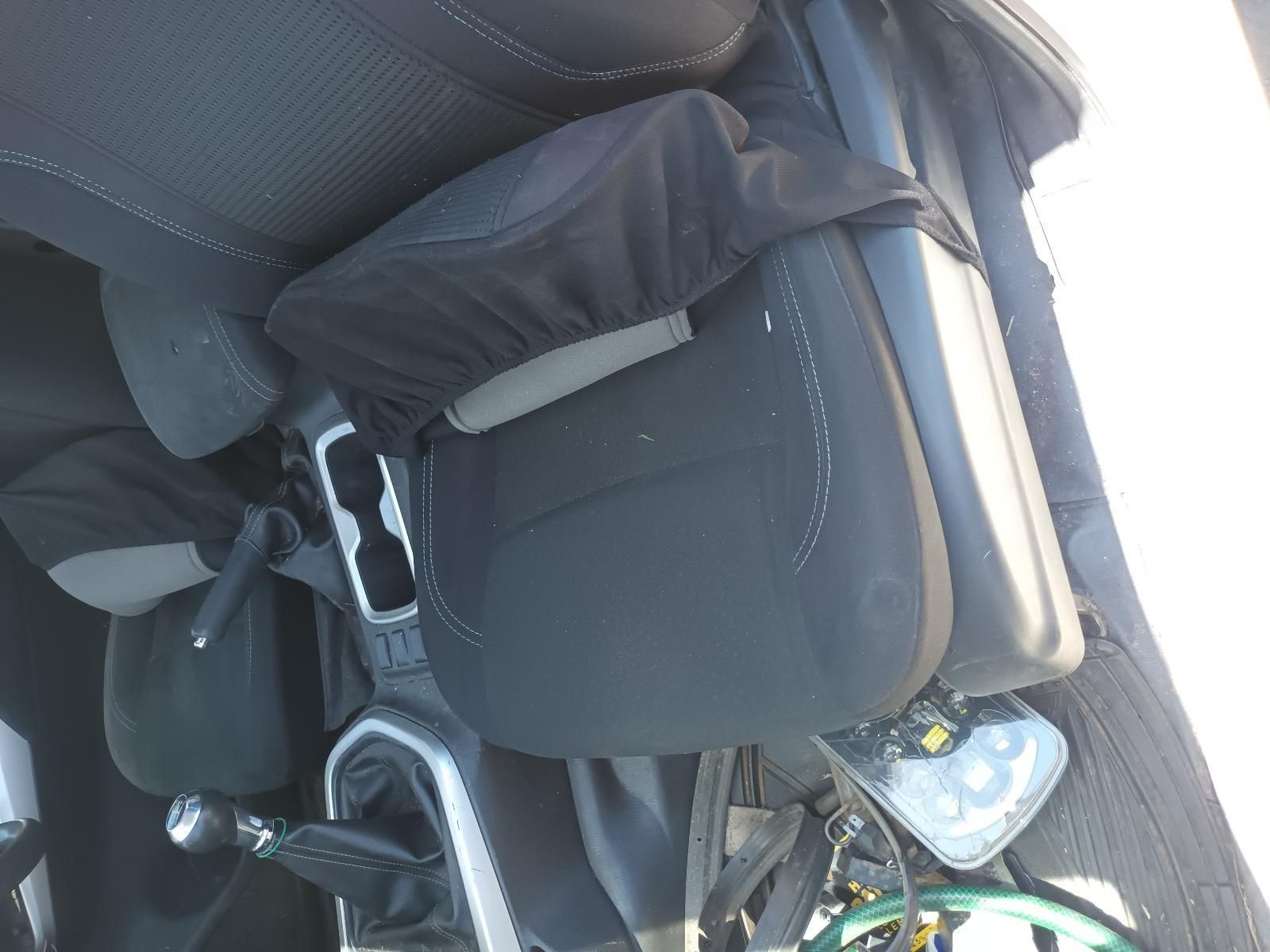 A Car Seat with a Cover on It is Sitting in a Car — South West 4WD Wreckers In Brisbane, QLD