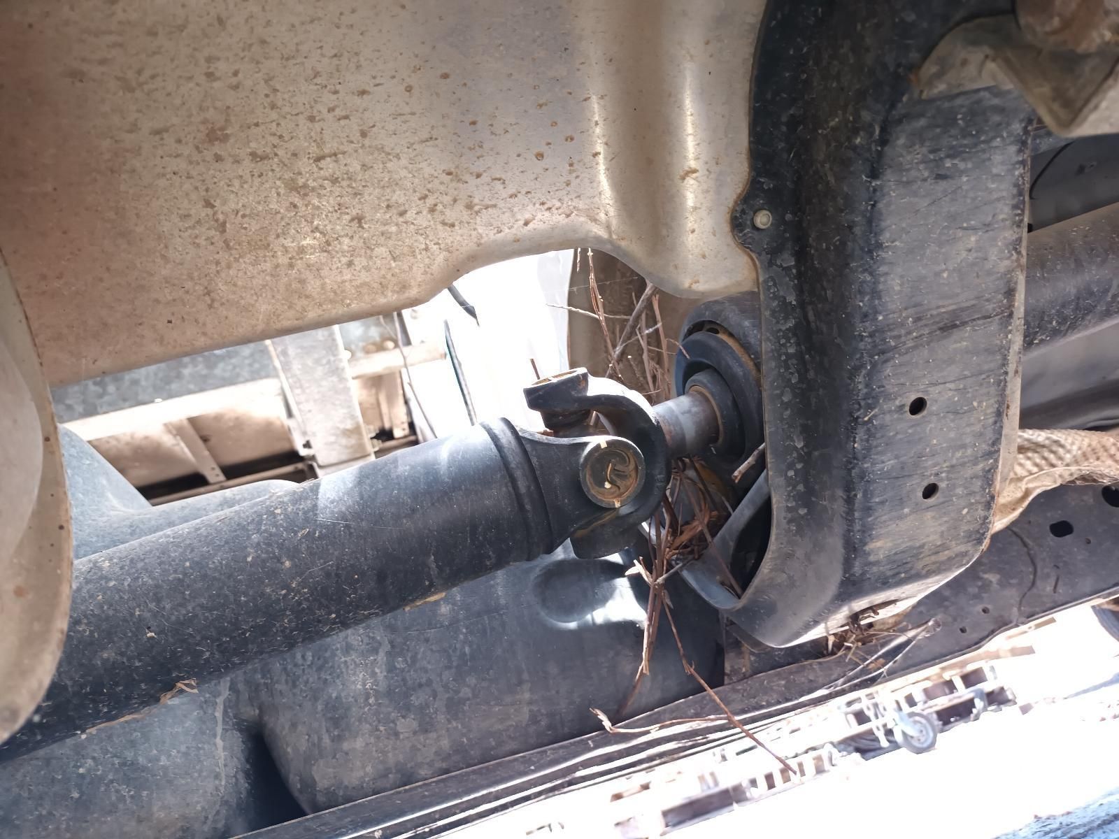 A Close Up of the Underside of a Car with a Hose Attached to It — South West 4WD Wreckers In Brisbane, QLD