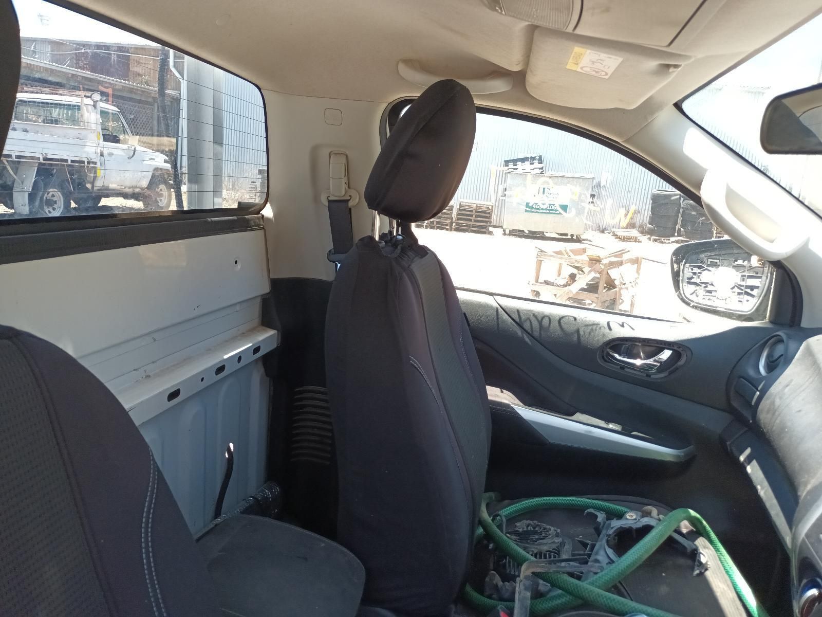 The Inside of a Truck with a Hose in the Back Seat — South West 4WD Wreckers In Brisbane, QLD