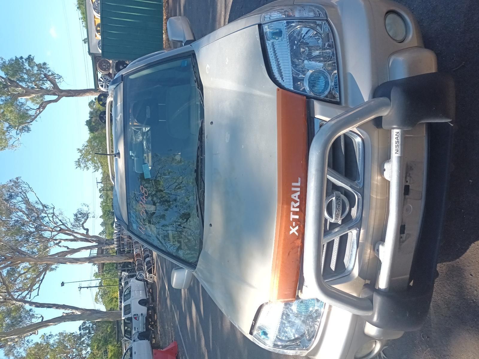 A Nissan X Trail is Parked on the Side of the Road — South West 4WD Wreckers in Harristown, QLD