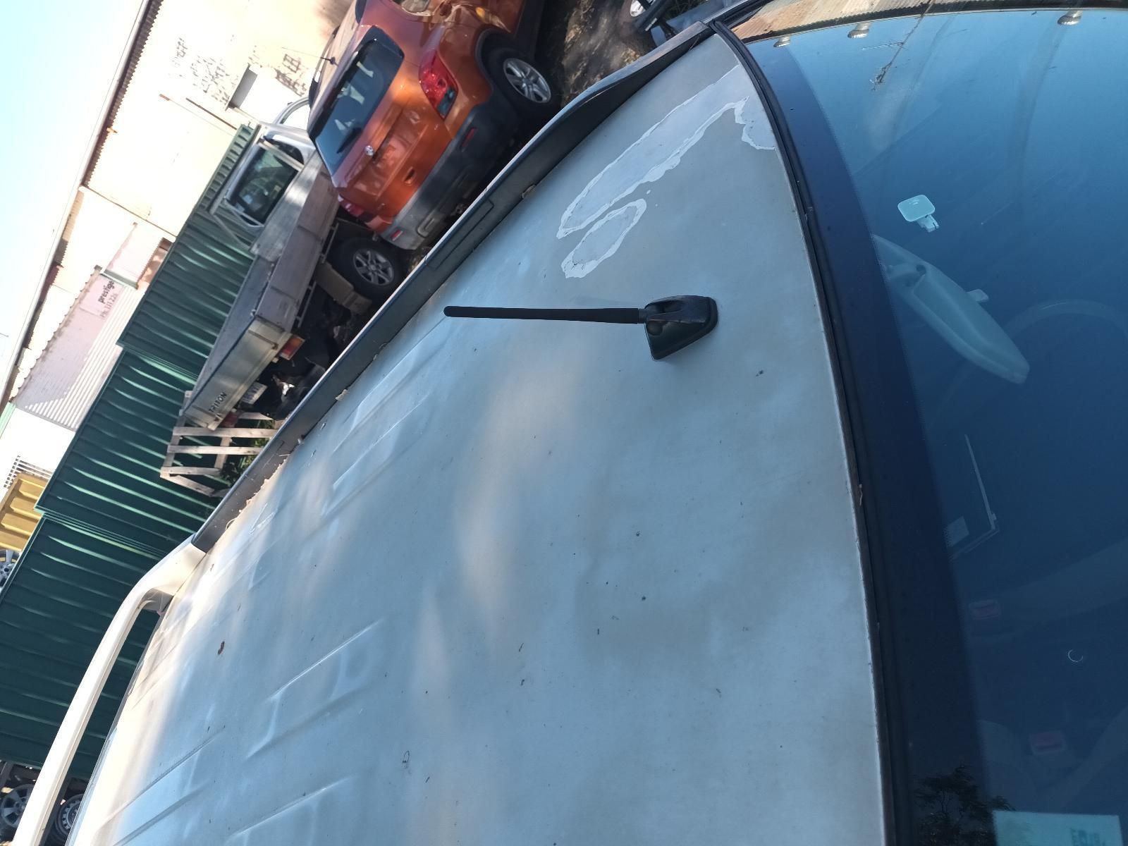 A White Van with a Black Antenna on the Roof — South West 4WD Wreckers in Harristown, QLD