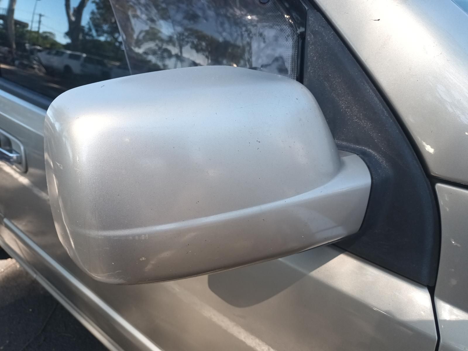 A Close Up of a Side View Mirror on a Silver Car — South West 4WD Wreckers in Harristown, QLD