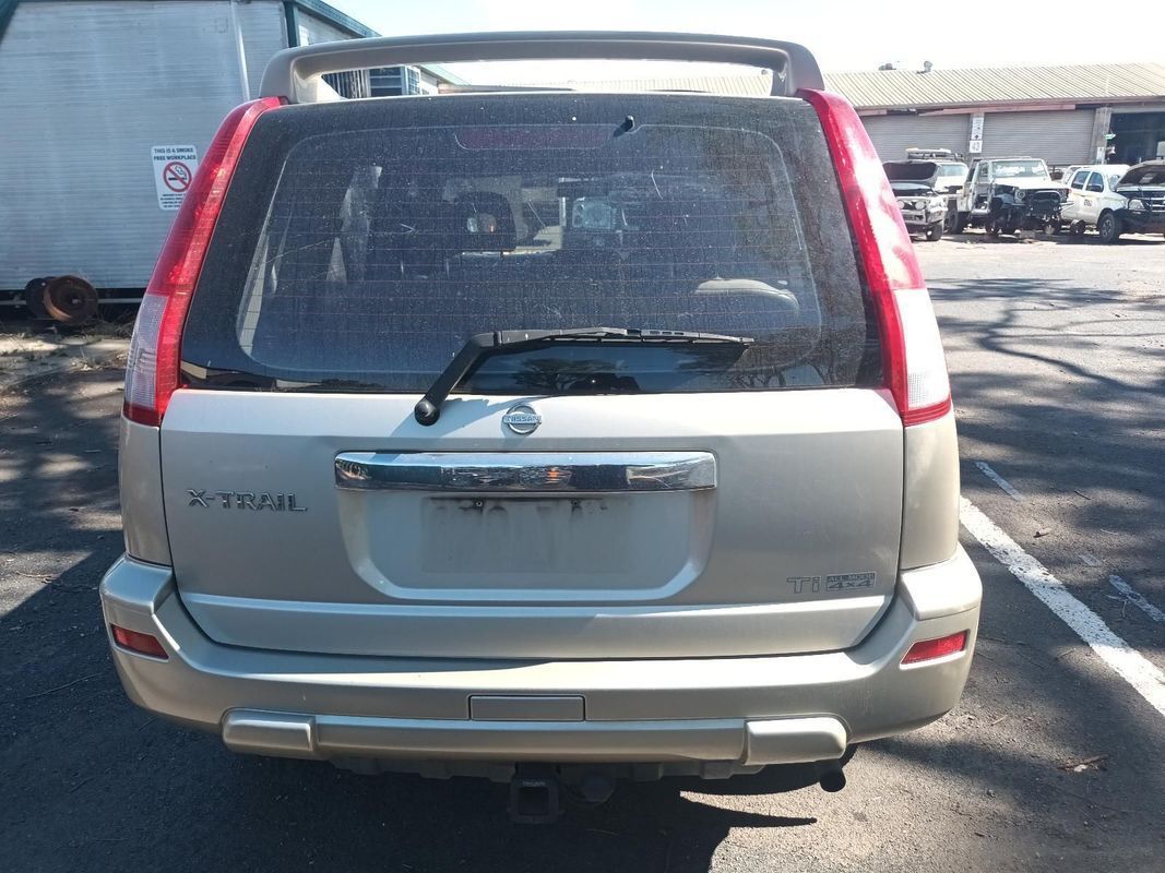 A Silver Nissan X Trail is Parked in a Parking Lot — South West 4WD Wreckers in Harristown, QLD