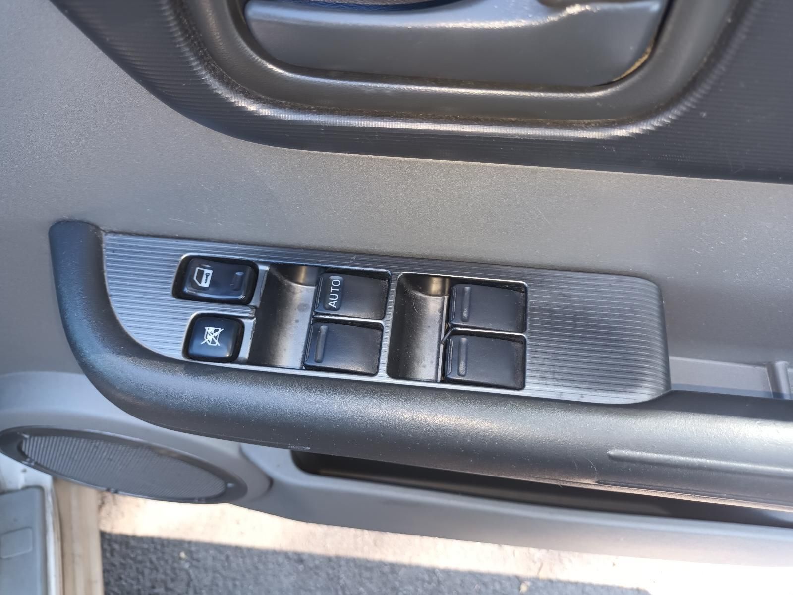 A Close Up of a Car Door with a Window Switch — South West 4WD Wreckers in Harristown, QLD