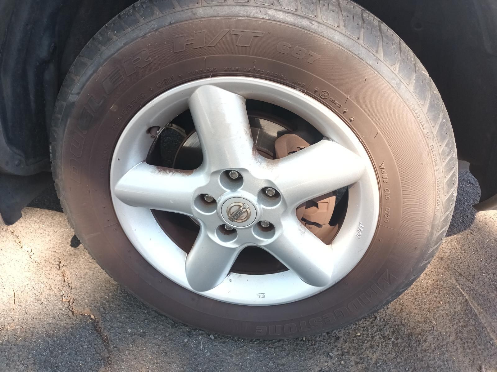 A Close Up of a Car Wheel with a Tire on It — South West 4WD Wreckers in Harristown, QLD