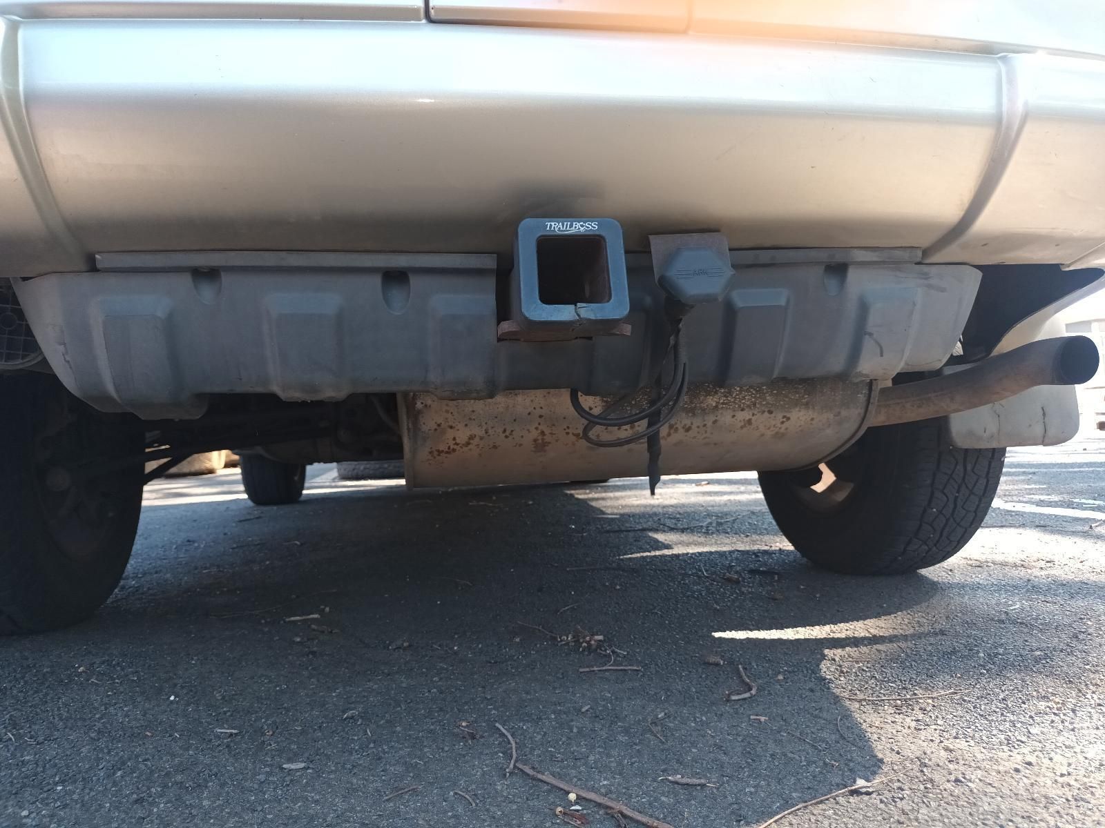 A Silver Car with a Tow Hook on the Back of It — South West 4WD Wreckers in Harristown, QLD
