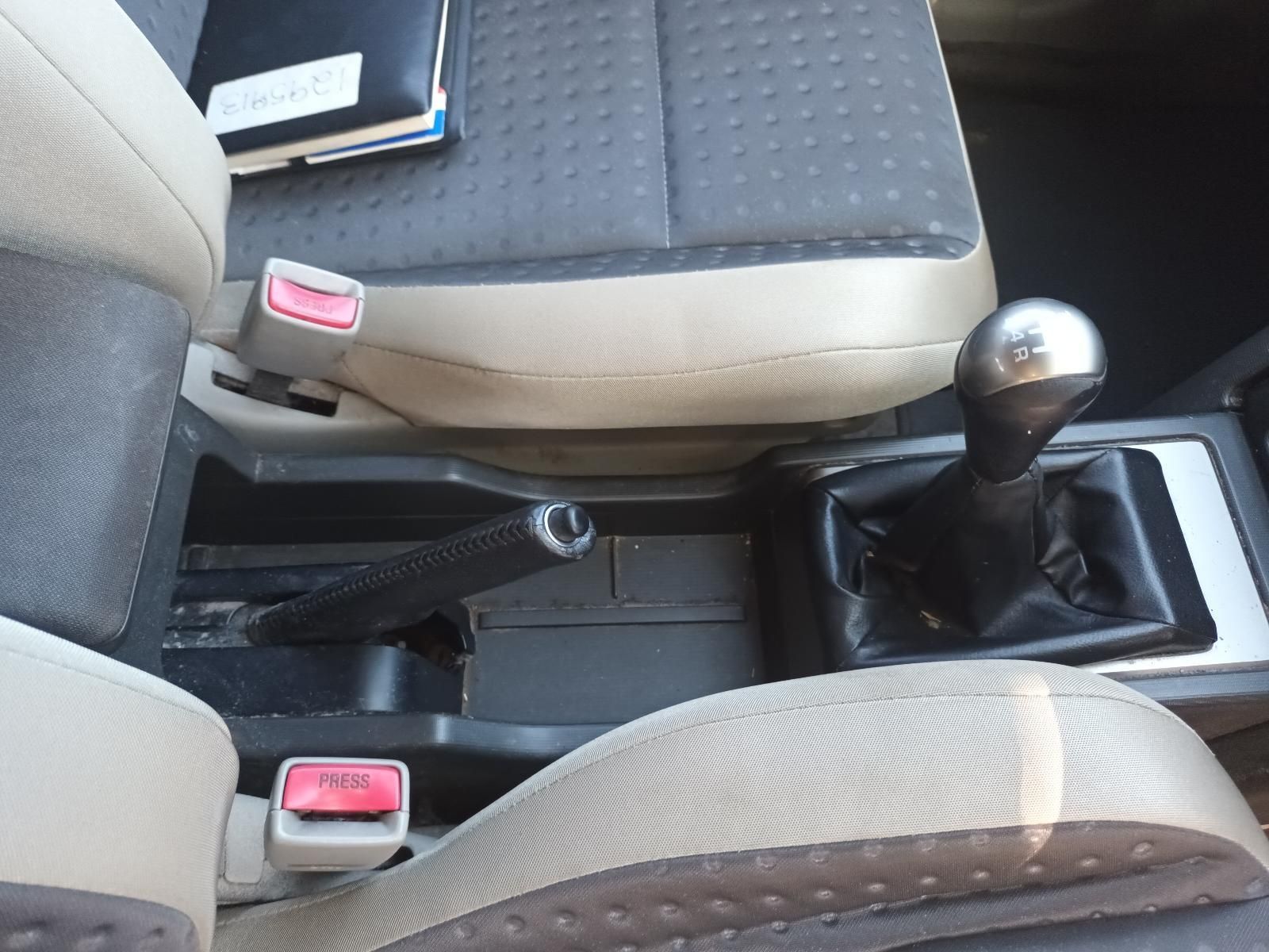 A Car Seat with a Red Push Button on It — South West 4WD Wreckers in Harristown, QLD