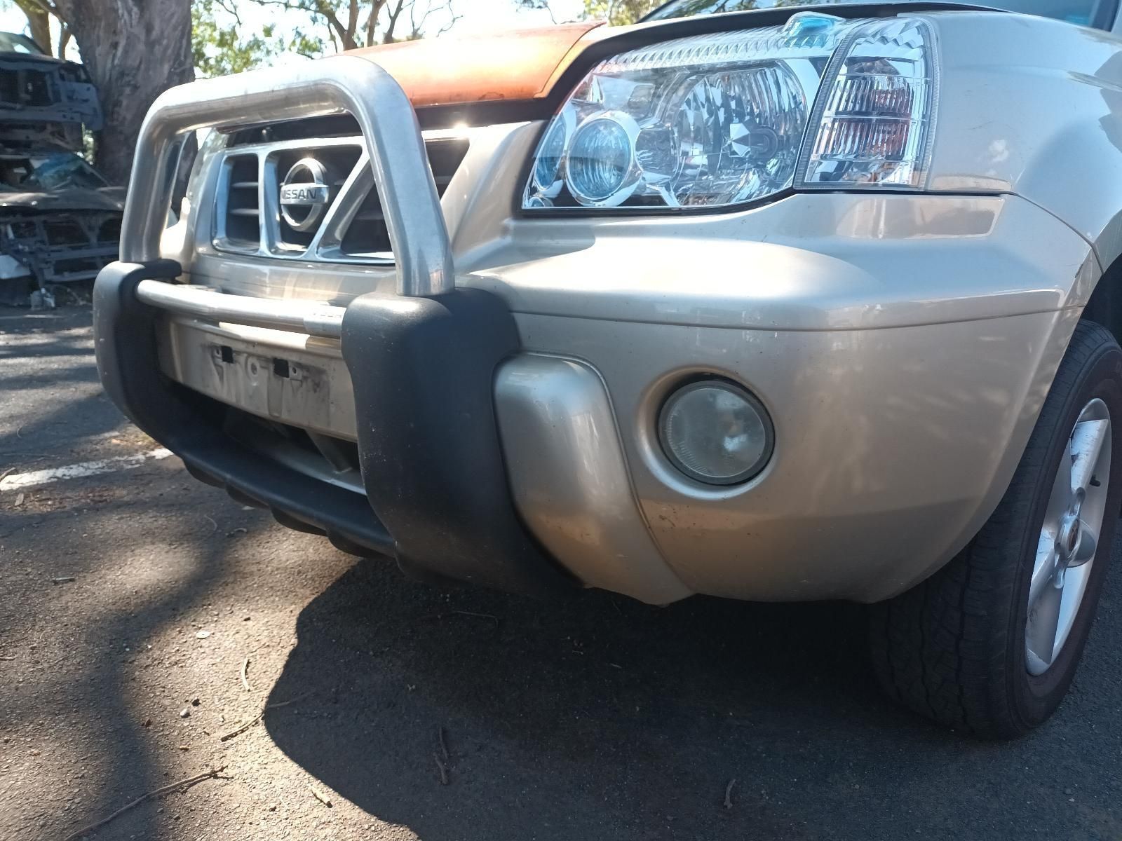A Silver Nissan X Trail is Parked on the Street — South West 4WD Wreckers in Harristown, QLD