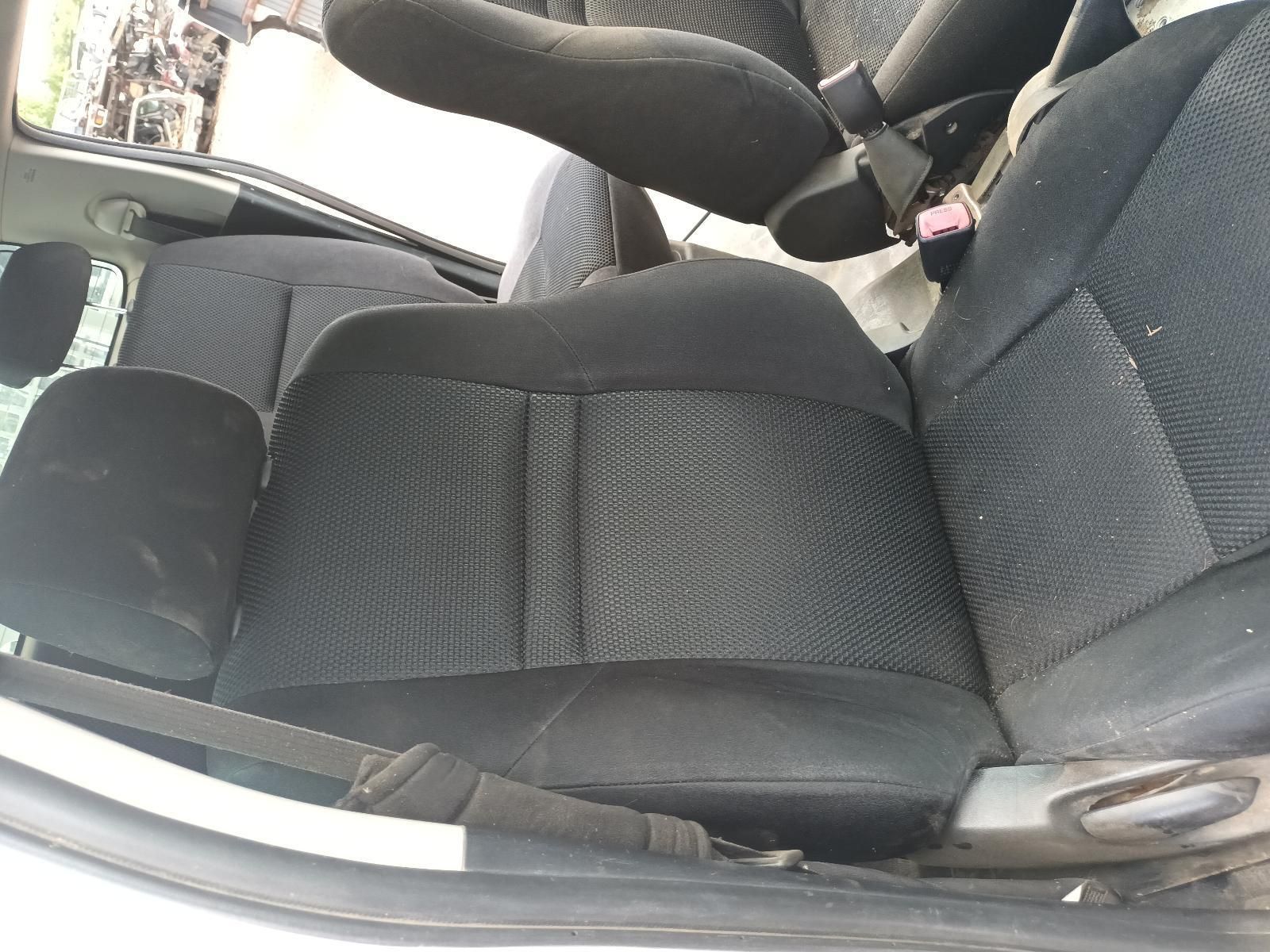 A Black Car Seat with a Seat Belt on It — South West 4WD Wreckers In Brisbane, QLD