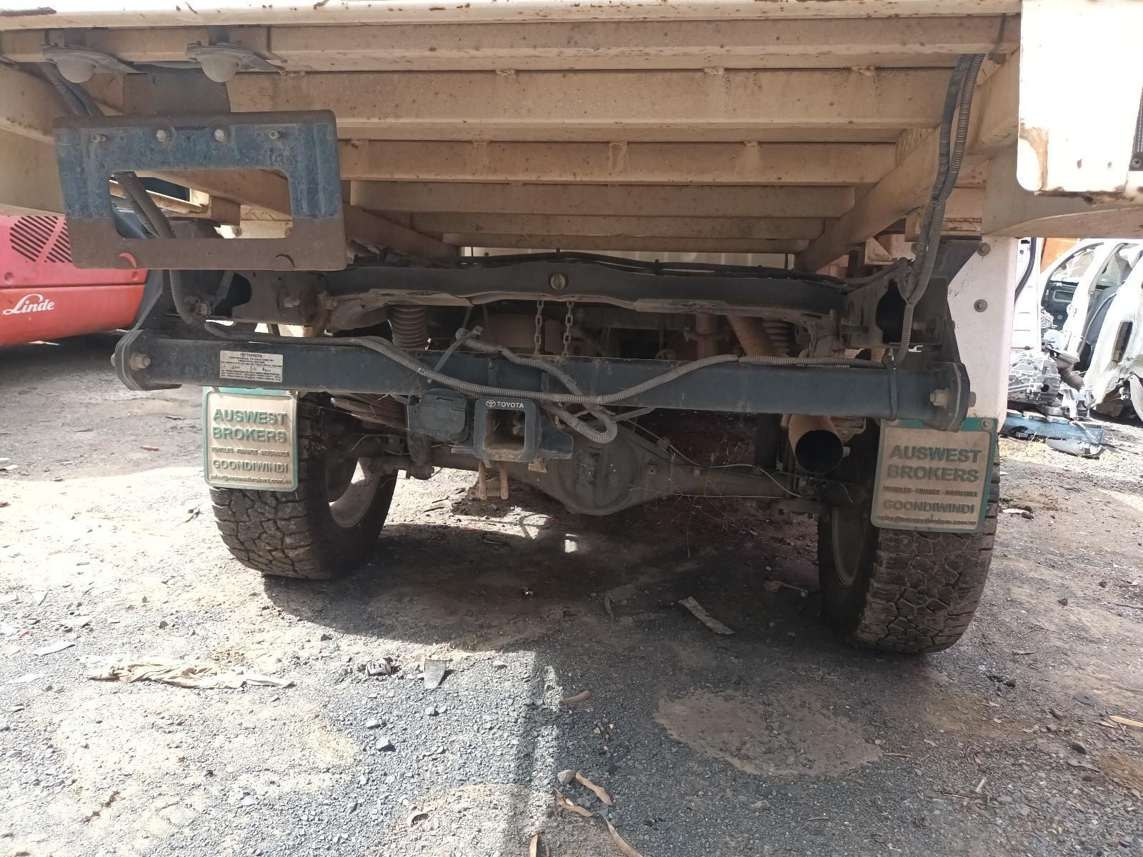 The Rear End of a Truck is Shown in a Parking Lot — South West 4WD Wreckers In Brisbane, QLD