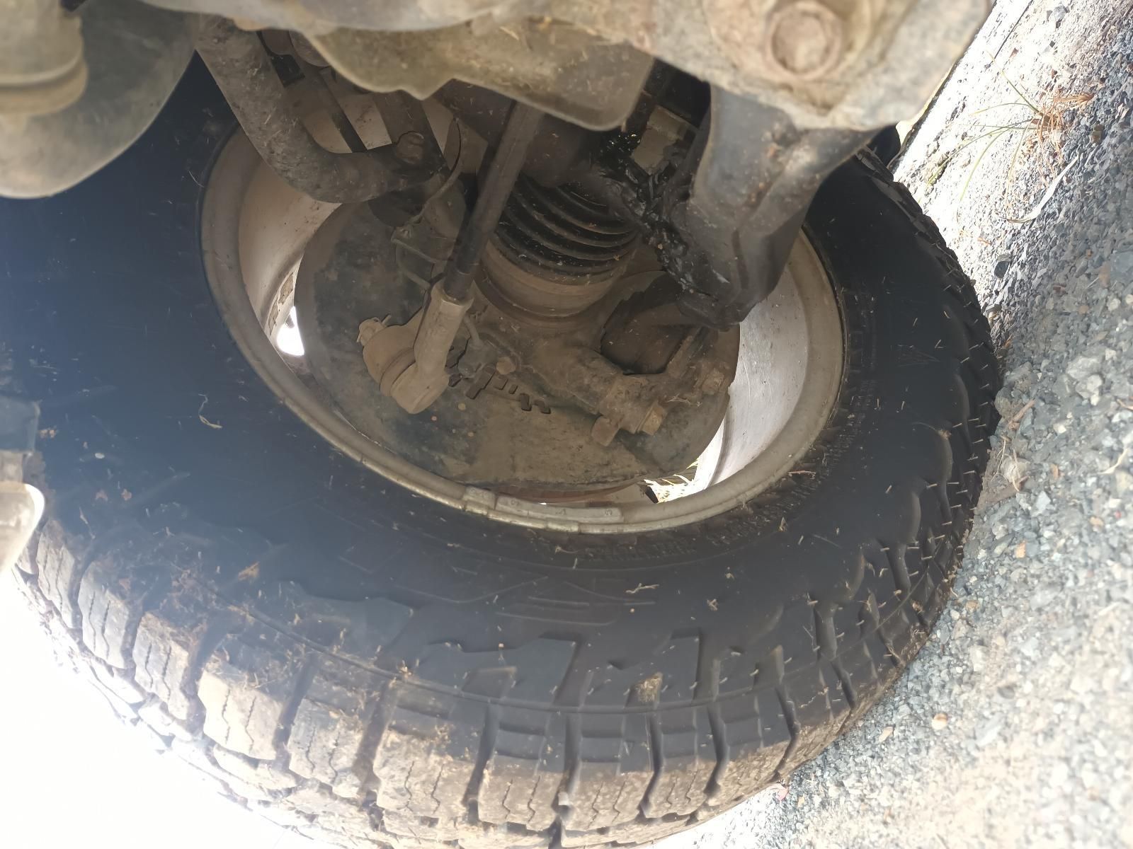 A Close Up of a Tire on a Car on the Ground — South West 4WD Wreckers In Brisbane, QLD