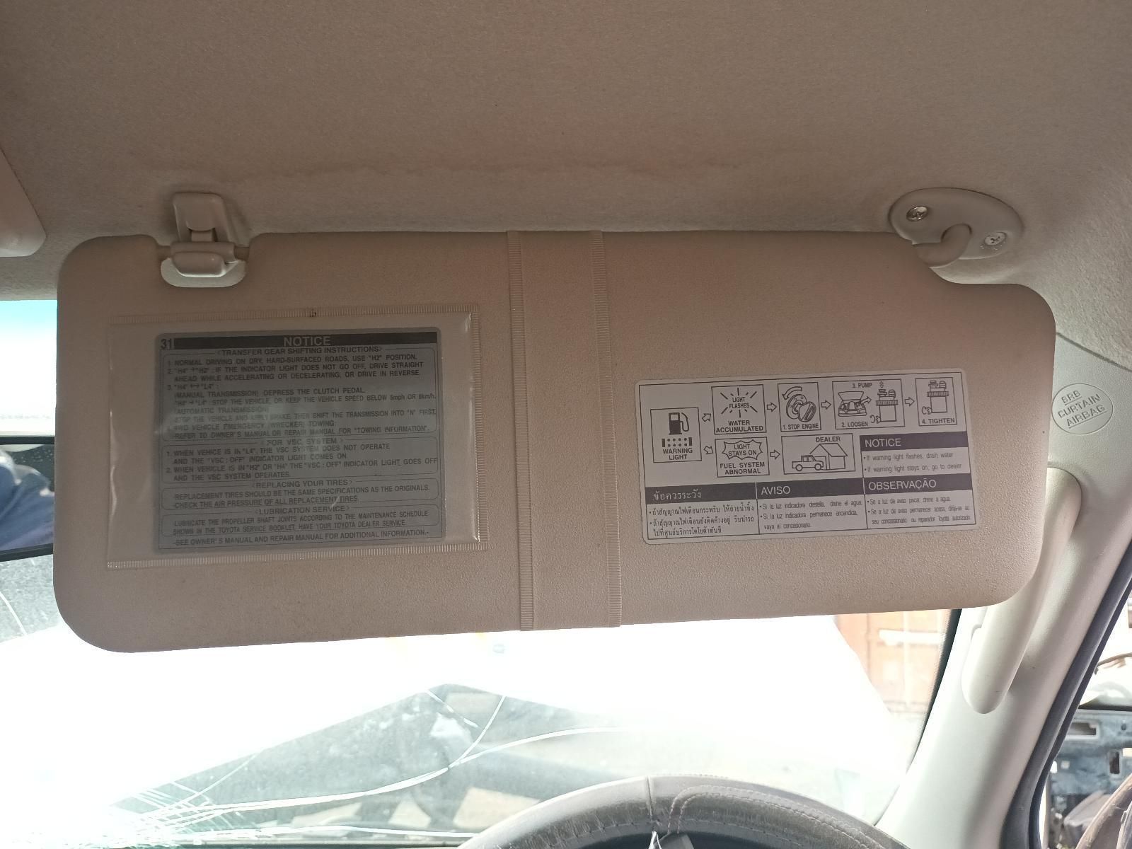 A Sun Visor is Hanging from the Ceiling of a Car — South West 4WD Wreckers In Brisbane, QLD