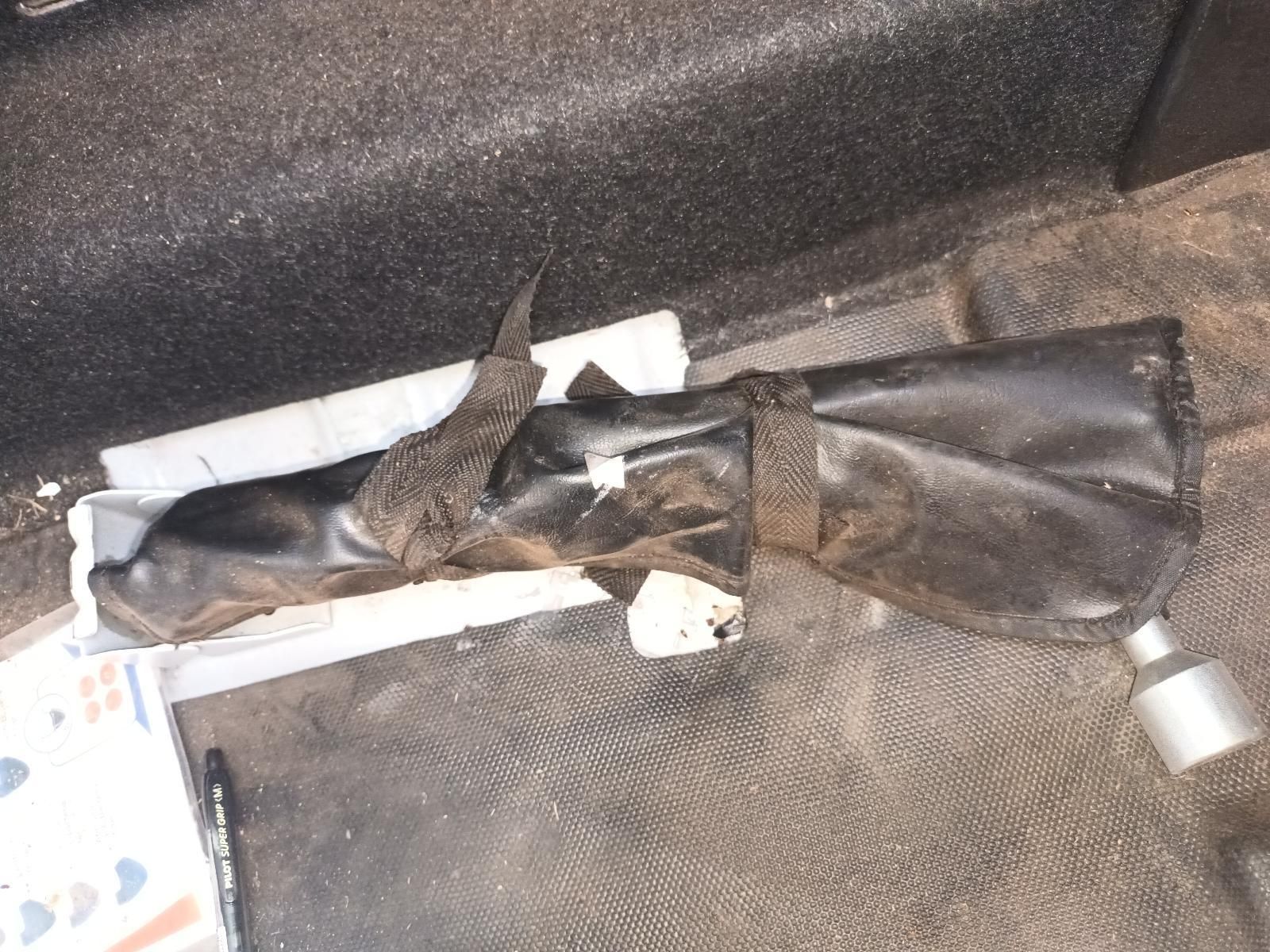 A Black Tool Bag is Laying on the Floor Next to a Box — South West 4WD Wreckers in Harristown, QLD