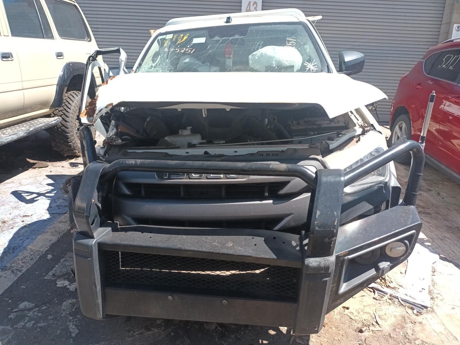 A White Truck with a Black Bumper is Parked in a Parking Lot — South West 4WD Wreckers in Harristown, QLD