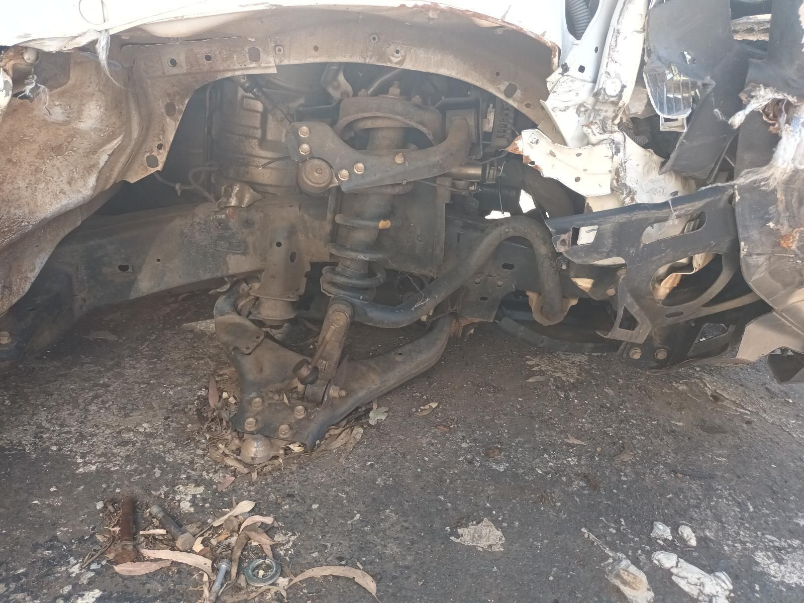 The Underside of a Car That Has Been Damaged by a Fire — South West 4WD Wreckers in Harristown, QLD