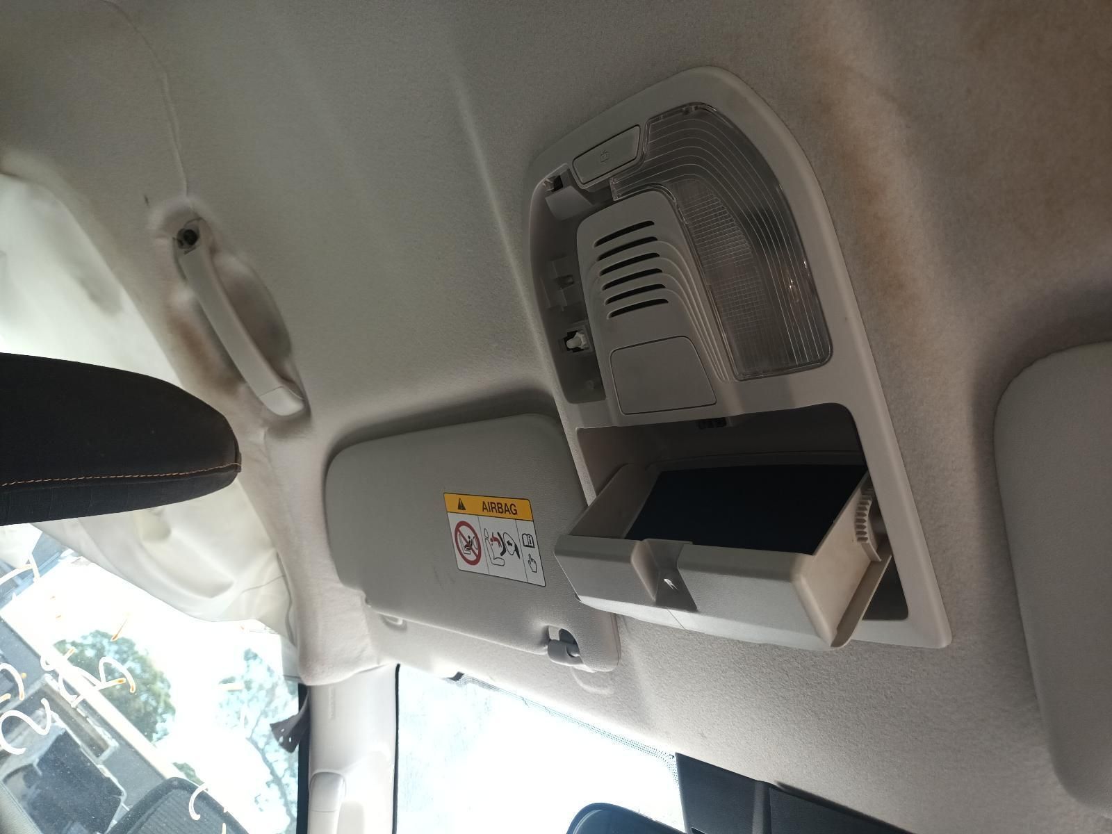 A Car Ceiling with a Sun Visor and a Rear View Mirror — South West 4WD Wreckers in Harristown, QLD