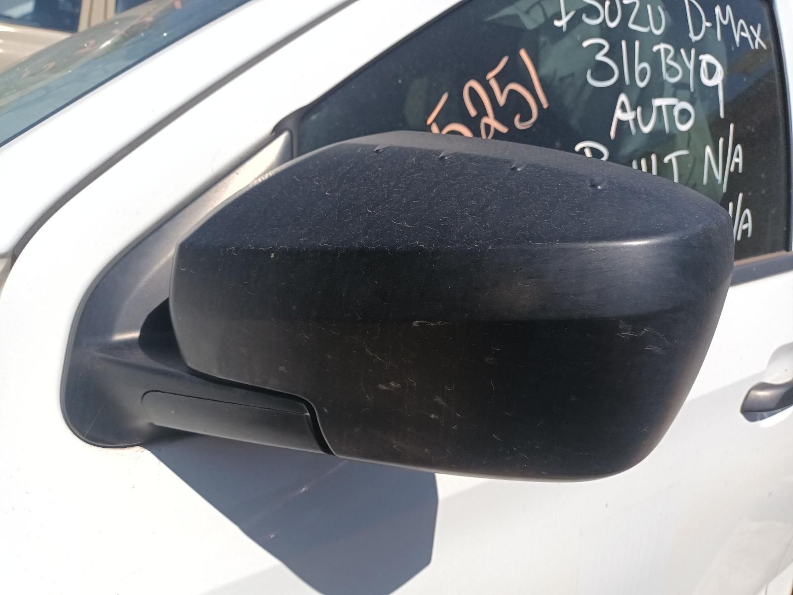 A Side View Mirror on a White Car — South West 4WD Wreckers in Harristown, QLD