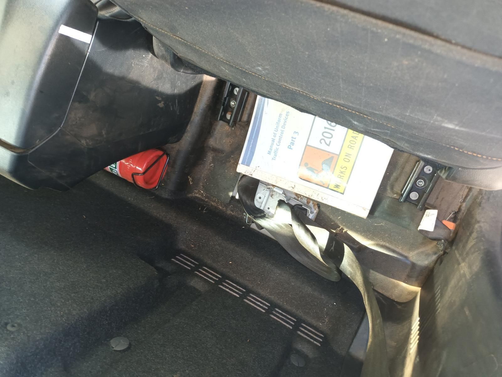 A Book is Sitting in the Back Seat of a Car — South West 4WD Wreckers in Harristown, QLD